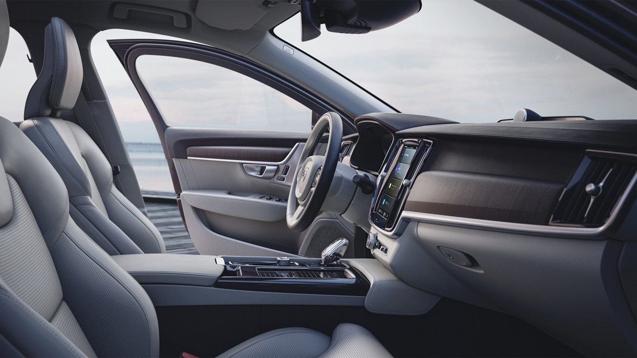Inside of a Volvo S90 with light interior.